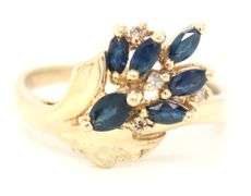 14kt Yellow gold marquise blue sapphire and diamond cluster ring