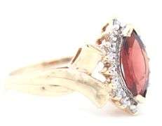 10kt Yellow gold marquise garnet and diamond ring