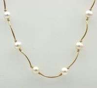 14kt Yellow gold pearl and gold Tubular link station necklace