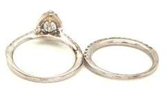 14kt White gold 0.35ct pear shaped diamond halo engagement ring set