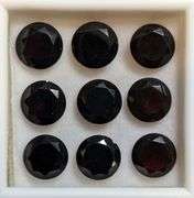 Midnight crimson 18.06ct Mozambique Garnet set