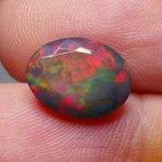 Just look at the fiery red flashing in this 2.65ct Black Opal!