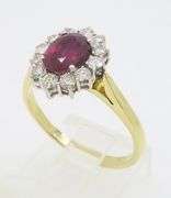 Beautiful 18k Gold Ruby & Diamond Halo ring