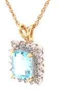 14kt Yellow gold 3ctw blue topaz and diamond accent pendant on chain