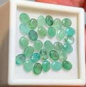 You get a beautiful mix of greens in this 9.35ct Emerald set!