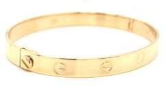 14kt Yellow gold love style bangle bracelet
