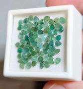 You get a beautiful mix of greens in this 6.96ct Emerald set!