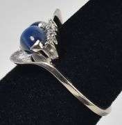 Mesmerizing 14K white Gold Star Sapphire Gemstone Ring with Diamond Accents
