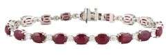 New 16.17ctw Oval Ruby and 1.55ctw Diamond Tennis Bracelet in 14K