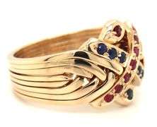 18kt Yellow gold ruby and sapphire puzzle ring