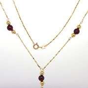 14kt Yellow gold garnet and gold beads lariat necklace