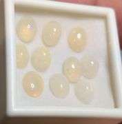 Glistening white! 8.08ct untreated Ethiopian Opal set!