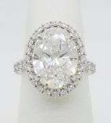 Incredible 6.77CTW Certified Diamond Halo Ring