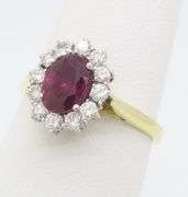 Beautiful 18k Gold Ruby & Diamond Halo ring