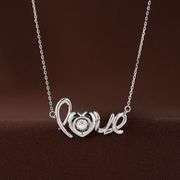 Beautiful "love" center stone dancing pendant