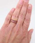 Pair of Ruby Eternity Bands in 18k