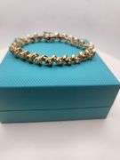 14KT Gold Ruby and Diamond Tennis Bracelet