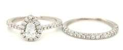 14kt White gold 0.35ct pear shaped diamond halo engagement ring set