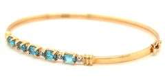 14kt Blue topaz bangle bracelet