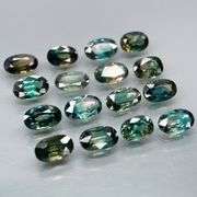 Heated only! 4.48ct blue green Sapphire set