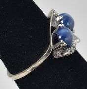 Mesmerizing 14K white Gold Star Sapphire Gemstone Ring with Diamond Accents
