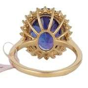 New 6.50ct Oval Tanzanite and 0.52ctw Diamond Frame Ring in 14K
