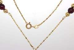 14kt Yellow gold garnet and gold beads lariat necklace