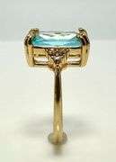 Breathtaking 14 kt Yellow Gold Plate 6.5 Ct Emerald Cut Simulated Swiss Blue Topaz Ring