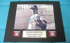 HAND SIGNED SANDY KOUFAX 5X7 IN A 8X10 DISPLAY WITH COA
