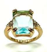 Breathtaking 14 kt Yellow Gold Plate 6.5 Ct Emerald Cut Simulated Swiss Blue Topaz Ring