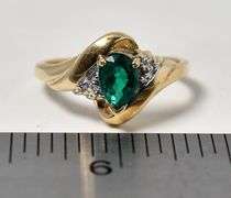 Beautiful 10K Yellow Gold Synthetic Emerald Gemstone Ring with Diamond Accents