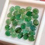 Heavy 10.43ct oval cut 30pc Zambian Emerald set!