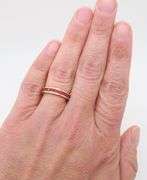 Pair of Ruby Eternity Bands in 18k