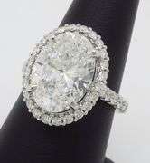 Incredible 6.77CTW Certified Diamond Halo Ring