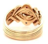 18kt Yellow gold ruby and sapphire puzzle ring