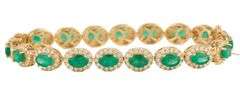 New 7.75ctw Oval Emeralds and 2.60ctw Diamond Frame Tennis Bracelet in 14K