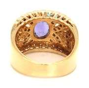 18kt Yellow gold Levian 1.21ct bezel set tanzanite and diamond open work wide ring