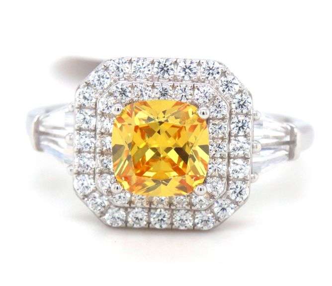 Yellow cushion cut and white round and baguette cubic zirconia ring in 925 sterling silver