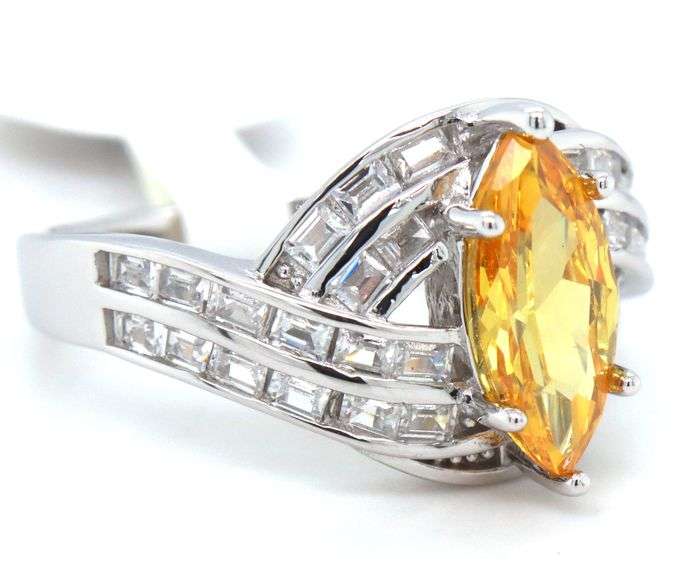 Yellow marquise and white baguette cubic zirconia ring in 925 sterling silver