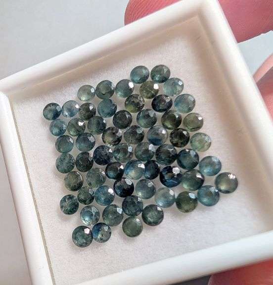 Heated only! 8.58ct blue green Sapphire set