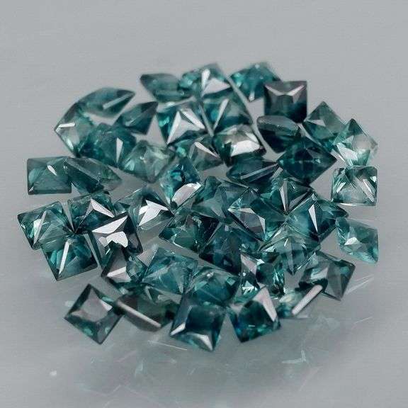 Multi-hue 5.42ct natural blue green Sapphire set