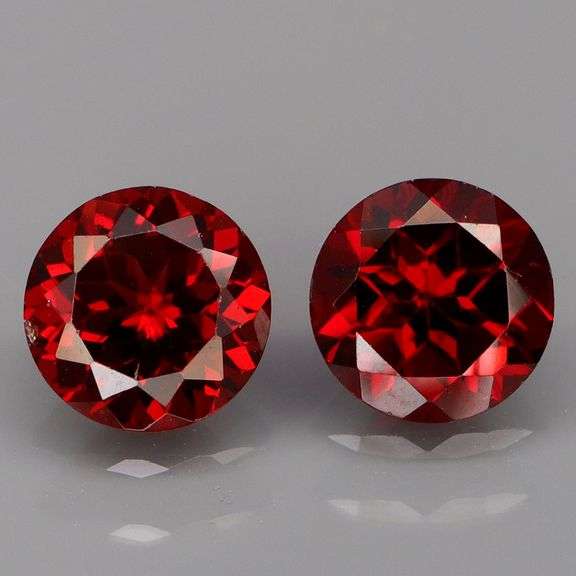 Mozambique red! 4.67ct matched round cut Garnet pair!