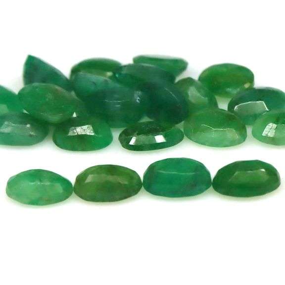 Rich emerald green 9.87ct 22pc Emerald set