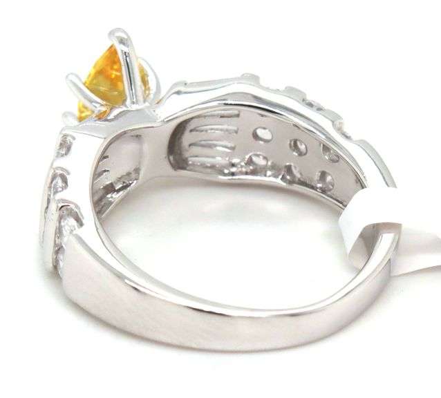 Yellow Marquise and white round and baguette cubic zirconia ring in 925 sterling silver