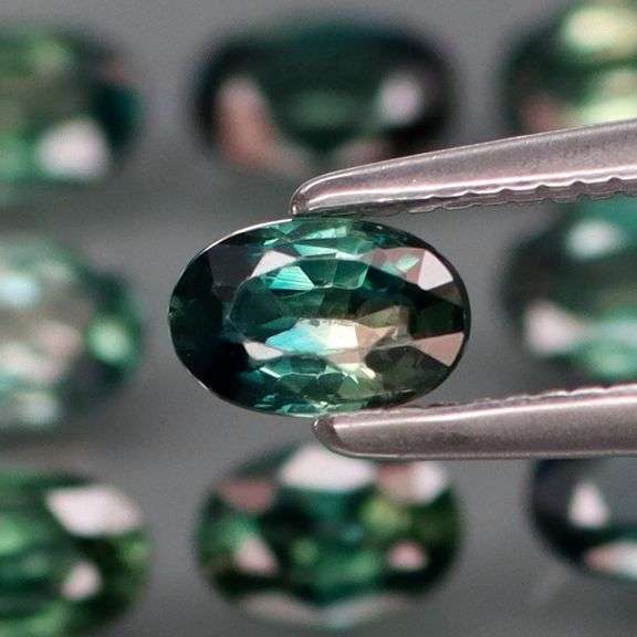 Heated only! 3.10ct blue green Australian Sapphire set