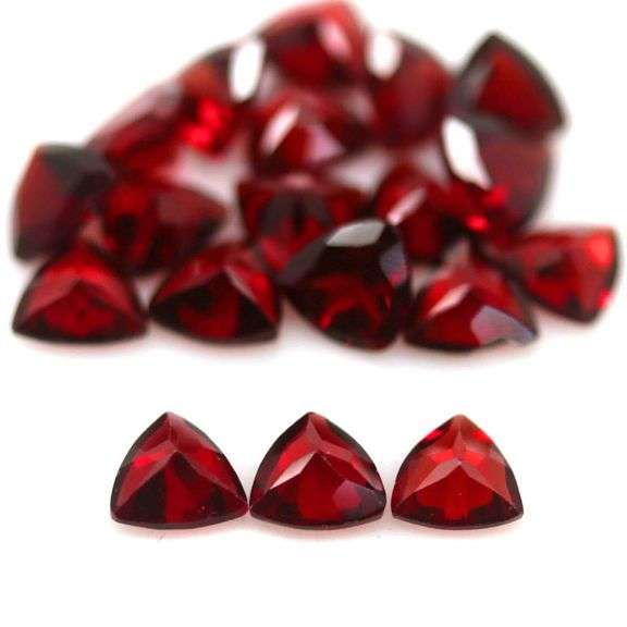 Stunning 14.96ct trillion cut cherry red Garnet set