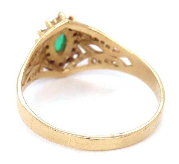14kt Yellow gold marquise emerald and diamond ring