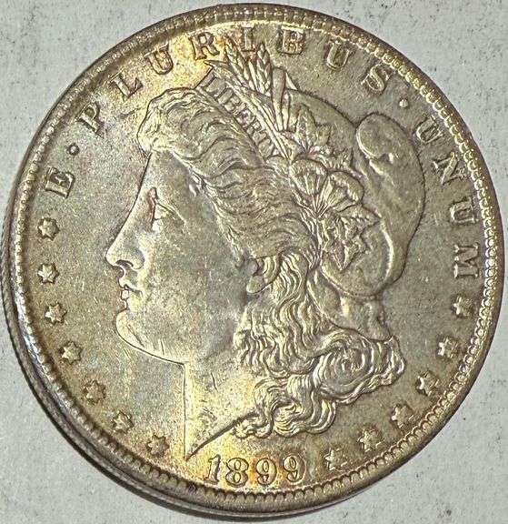 1899 O Slider Toned Morgan Dollar
