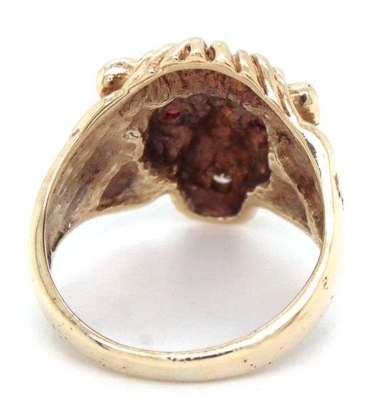 10kt Yellow gold Lion head ring with ruby eyes and diamonds