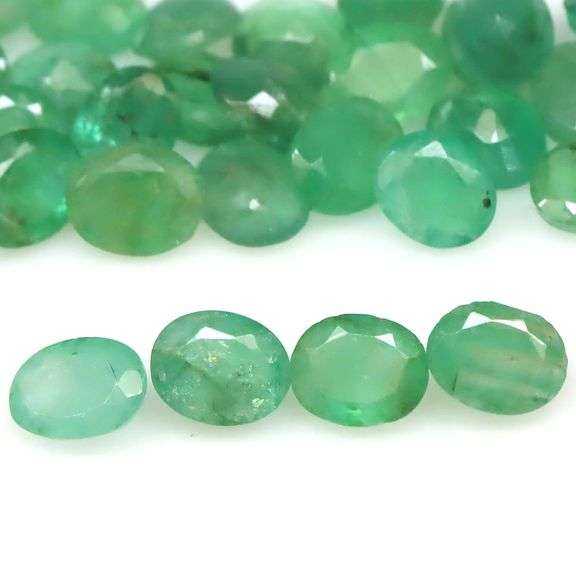 Bright emerald green 10.96ct 34pc Emerald set